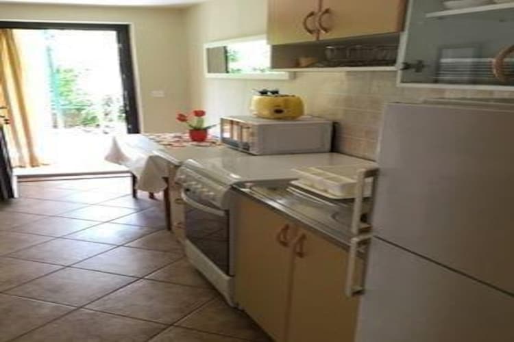 Apartments Merica are located on the marvelous Island of Brač (Supetar), just 600 m meters away from the nearest beach.

Luggage storage before check in and after check out is available so that you can explore the place a bit more before departure.

Free private parking is available to the guests.

This lovely two bedroom apartment is a perfect fit for up to four persons. It features TV,  Wi-Fi and air conditioning. The kitchen is fully equipped and it comes with dining area. 
The apartment has a private bathroom with shower.

The closest restaurant can be reached in 600 m range as well as the grocery store. Post office and the bank can be found in 800 m range while the gas station, ferry bar, tourist info, ambulance and pharmacy are 1 km away from the property.

Airport Zadar, Split is 42 km  away from Apartments Merica.