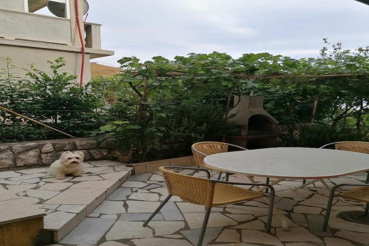 House Panorama is situated in the lovely coastal town of Novi Vinodolski, famous for its natural beauty and crystal clear sea.
A spacious shared terrace with an outdoor dining area as well as common BBQ facilities and a shared garden are at your disposal, which makes this place ideal for a nice and relaxing family or friends vacation.
Luggage storage is possible prior to check in and after check out, so you can explore the city a little more before your departure.
Free private parking is provided, reservation is not needed.
Wifi is available throughout the property.

This one-bedroom apartment with a terrace and sea view can accommodate up to four people. It features SAT LCD TV as well as air-conditioning. Living room comes with a sofa. The kitchen is equipped with a refrigerator, water kettle, microwave, stove, coffee maker, and kitchen utensils. This apartment is pet friendly. The private bathroom comes with a shower and toilet. Free toiletries, a hairdryer as well as linens and towels are at your disposal.
This one-bedroom apartment with a terrace and sea view is located on the ground floor.

Due to the properties' good location, everything you may need during your stay can be found in the area. Market, bars, restaurants, children's playground, ATMs - all can be found within 500 m radius from the property. The beach is 1 km from the property. The pharmacy is 500 m away.

Rijeka airport is 20 km away from the property, bus station is 2 km from the property.