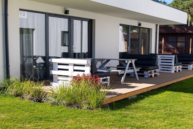 Ground floor: (open kitchen(electric kettle, boiling water tap, cooker(2 ring stoves, electric), fridge-freezer), Living/bed room(double sofa bed, TV, dining table), sleeping niche(single bed, single bed), bathroom(shower, washbasin, toilet))\n\nOn the 1st floor: (bedroom(double bed, double bed))\n\nterrace, garden, garden furniture, sun loungers, BBQ, trampoline, sand pit, play equipment, slide, hammock, high chair