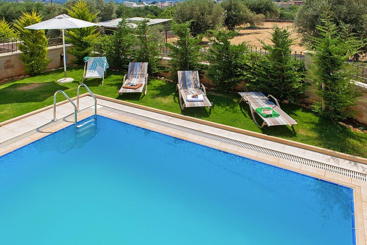 Surrounded by a spacious olive grove, you can let yourself be captured by the traditional charm of Crete in the modern ambience. Look forward to the stylish furnishing of your holiday villa, which leaves nothing to be desired. The special amenities include not only a very comfortably equipped kitchen and a jacuzzi in one of the two bathrooms, but above all the private outdoor pool with a great sun terrace. So if you don't want to start an exciting excursion, you can relax on the loungers under the parasol and refresh yourself in the pool. Let the evening fade away in a private atmosphere on the candlelit veranda or, if it should be cooler, in the living room in front of the fireplace. Above the eastern bay of Rethymnon, the village of Adele lies around two kilometers from the coast and the beach. The surrounding flat terrain is the Plains of Adele. The good tourist infrastructure guarantees you a large selection of gastronomy as well as sports and leisure facilities from March to November. On the beach you will find many other water sports options in addition to a diving center. HighLights: WLANConsumption-based energy costs, bed linen, towels, final cleaningWelcome packageTourism feeIntermediate cleaning 2 x per week including activities nearby: On Crete and especially in the area around Rethymnon you are guaranteed eventful holidays. Only a few kilometers separate you from the most beautiful and longest beaches on the island. On top of that, the region is characterized by numerous gorges with some grottos and caves, which you can discover, for example, on a hike. Whether a trip to the Lassithi Plateau or the Samaria Gorge - there are many areas for hikers that you can easily explore on foot. If you are interested in culture, we also recommend a day trip to the famous palace of K