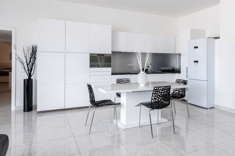 Ground floor: (Living room(dining table), Kitchen(stove, electric kettle, toaster, coffee machine(espresso), oven, microwave, dishwasher, fridge, dishes and cutlery), bedroom(Queen Bed), bedroom(double bed), bedroom(single sofa bed), bathroom(bath tub, shower), bathroom(shower), bathroom(shower))\n\nElevator, Hot Water, Internet Access DSL, Wardrobe, First Aid, TV, cot, washing machine, balcony or terrace, heating, air conditioning, iron, hairdryer, crib(free), Towels/Sheets (Incl.), shampoo, Essentials