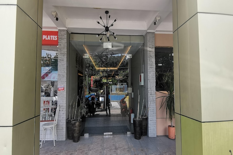 Welcome to Townhouse Oak Grey Hotel, a comfortable and convenient stay near Clark International Airport—perfect for solo travellers, families, and group stays. Built in 2000, this well-maintained property offers a relaxing atmosphere with modern comforts and warm hospitality.

Unwind in our non-smoking rooms or enjoy the designated smoking area for convenience. All rooms are air-conditioned and designed with travel comfort in mind, featuring a desk, tile/marble flooring, dining table, and private bathroom with shower, bidet, fresh towels, and toiletries. Selected rooms offer bathtubs and slippers for an added touch of comfort.

Choose from a range of room options including Single, Standard Double, Standard Triple, and our spacious Philippines Suite Family, ideal for families with a king bed and two single beds.

Enjoy daily housekeeping, paid laundry and dry-cleaning services, board games/puzzles for leisure, and outdoor dining and patio areas for a relaxed stay.

Stay connected in public areas with Wi-Fi and feel secure with CCTV surveillance and smoke alarms throughout the property. The hotel also offers tour desk services and tickets to attractions, making travel planning easy.

Street and self-parking are available free of charge. Breakfast is available (paid) and room service is offered during limited hours for your convenience.

Whether you’re visiting for business, leisure, or transit, Townhouse Oak Grey Hotel ensures a homely, budget-friendly, and pleasant stay near the airport—where comfort meets value with Filipino hospitality.

Languages spoken: English & Tagalog. Cash accepted.