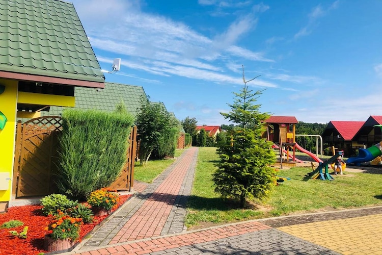 Domki wypoczynkowe - Promyczek-Jardins en été