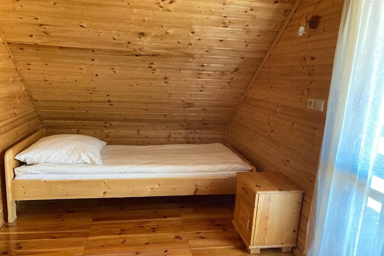 Domki wypoczynkowe - Promyczek-Chambre