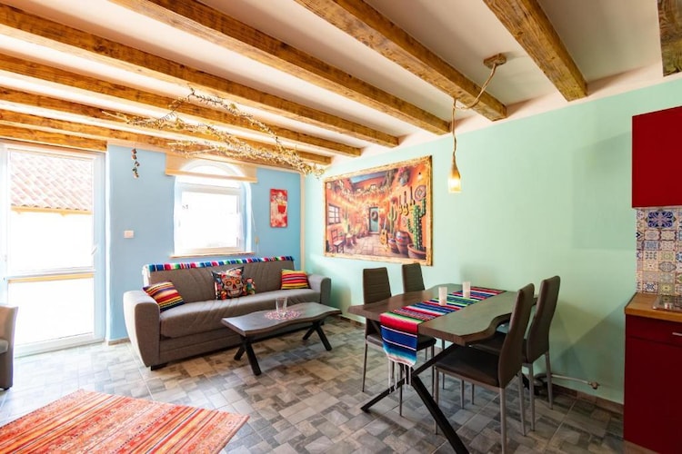 Ground floor: (open kitchen(hob(2 ring stoves, electric), electric kettle, toaster, microwave, dishwasher, fridge-freezer), Living/diningroom(double sofa bed, TV(flatscreen, smart TV, german television channels, international television channels), dining table, streamingservice), bathroom(shower, washbasin, toilet, washing machine, hairdryer))\n\nOn the 1st floor: (bedroom(double bed), bedroom(single bed, single bed))\n\nInternet access, Parking, Bike rental, Bar, Play area, Lawn, terrace(private), garden(shared with other guests, fenced), garden furniture, sun loungers, BBQ(shared with other guests, charcoal), swimming pool(shared with other guests, outside,  3 x  3 m., opened from Jul upto and including Aug), bicycles available(on request), high chair, ironing board, iron, Swing set, baby crib(free)