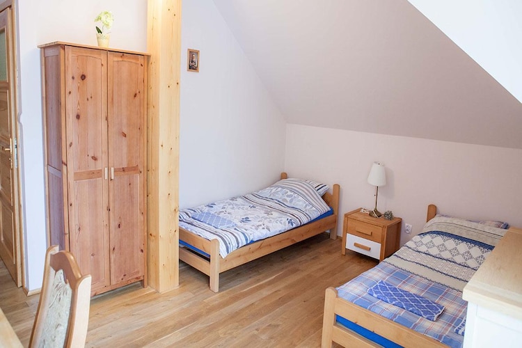 Ground floor: (Kitchen(shared with other guests, 25 m2)(TV, dining table, electric kettle, boiling water tap, cooker, microwave, fridge-freezer))\n\nOn the 1st floor: (Living/bed room(single bed, single bed, double bed, TV(satellite), dining table), bathroom(shower, washbasin, toilet))\n\nInternet access, sauna(paid), garden(shared with other guests, fenced, landscaped garden), garden furniture, BBQ, parking, play equipment