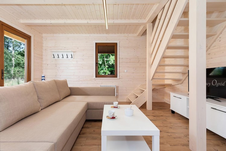 Ground floor: (open kitchen(hob(4 ring stoves, induction), electric kettle, toaster, hood, coffee machine, oven(mini), dishwasher, fridge-freezer), Living/diningroom(double sofa bed, TV(flatscreen), dining table), bathroom(shower, washbasin, toilet, hairdryer))\n\nOn the 1st floor: (bedroom(double bed, balcony), bedroom(single bed, single bed, single folding bed, single folding bed))\n\nReception, Internet access, Parking, Sporting field(s), Play area, Lawn, washing machine(shared with other guests), heating(electric, through air conditioning), air conditioning, terrace(private, roofed), garden(shared with other guests, fenced, 4400 m2), garden furniture, sun loungers, BBQ(charcoal), swimming pool(shared with other guests, outside, heatable, including part for children (depth 50cm),  8 x  5 m., opened from May upto and including Sep), slide(shared with other guests)