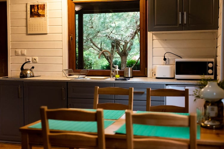 Holiday home with a fireplace and a large terrace