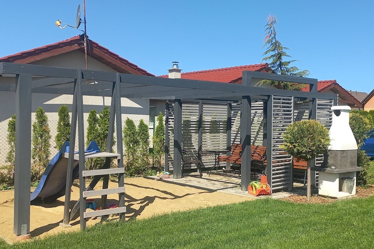 Domki wakacyjne we Wrzosowie - Jardins en été