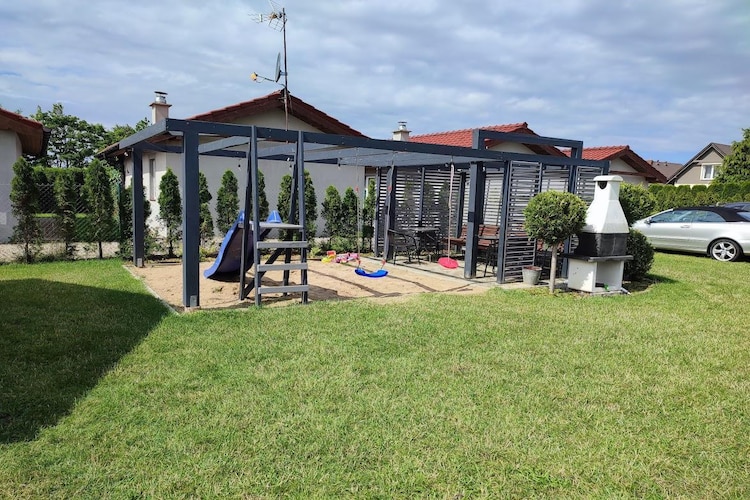 Domki wakacyjne we Wrzosowie - Jardins en été