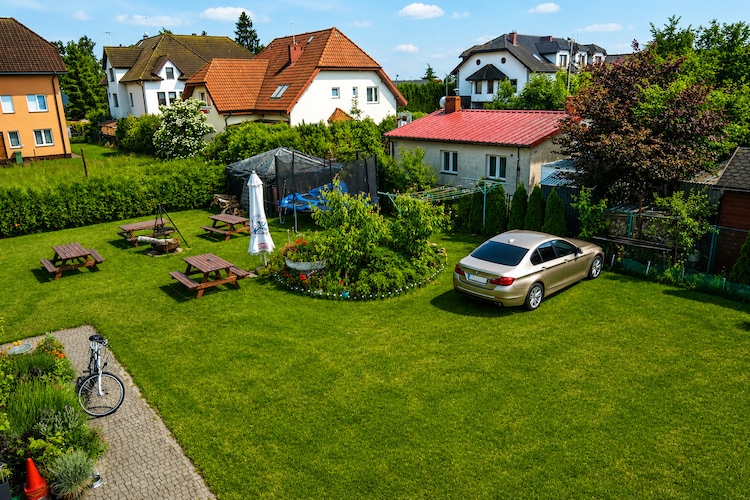 Apartament Bałtyk Dziwnówek - Jardins en été