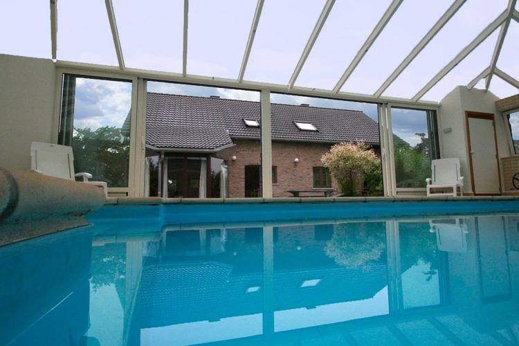 Cottage with swimming pool comprises two separate parts